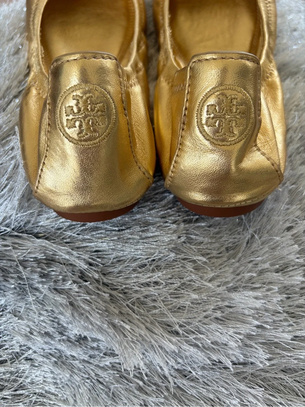 Tory Burch sleek metallic